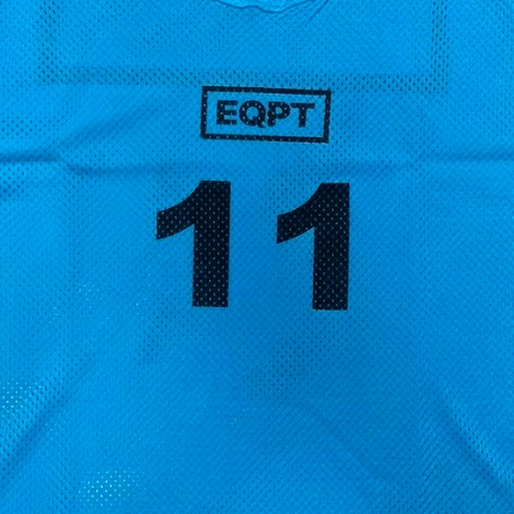 The EQPT mark and squad number on bib mesh